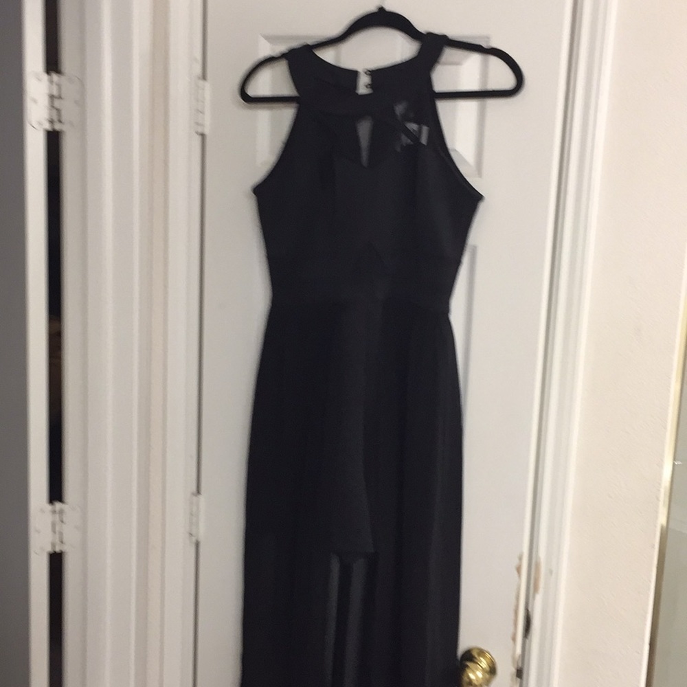 Black romper with sheer over skirt.